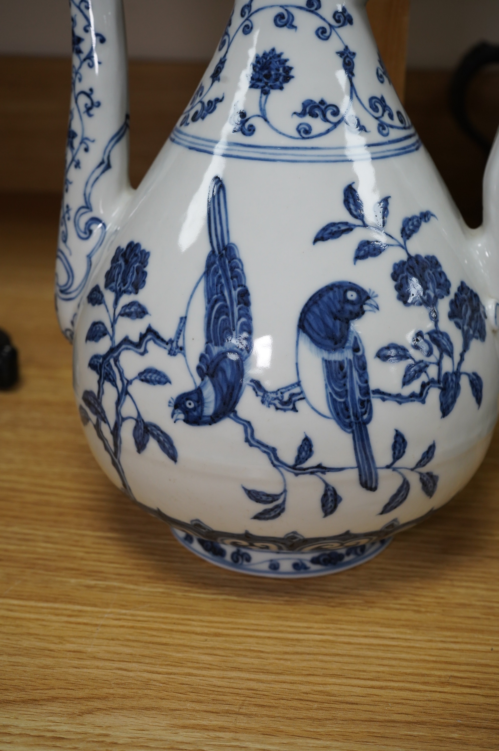 A large Chinese blue and white porcelain ewer, 31cm high. Condition - good
